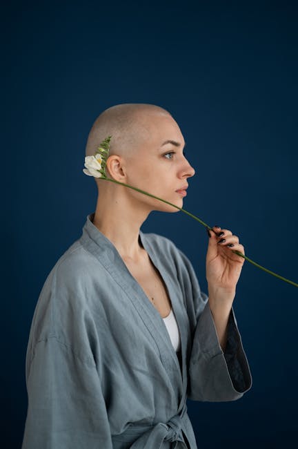 Empowered woman with flower signifying natural beauty
