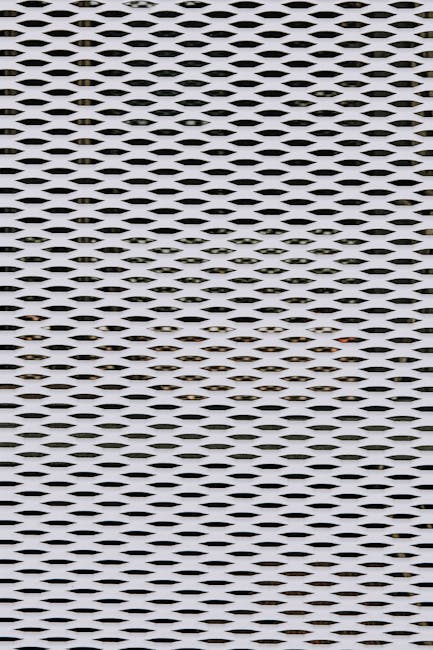 Perforated metal texture representing industrial design